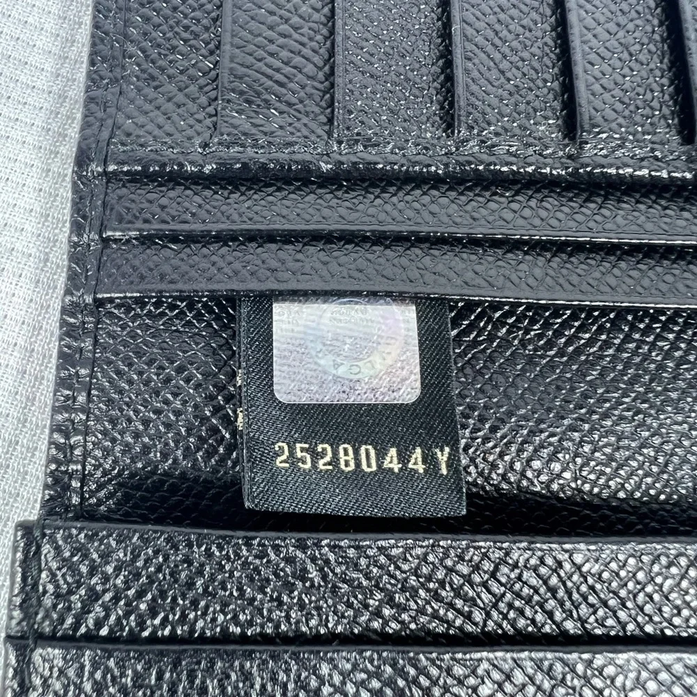 1050: Bvlgari Logo Ring Continental Wallet Black Grained Leather Blue